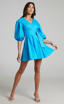 Zyla Puff Sleeve Wrap Mini Dress in Blue