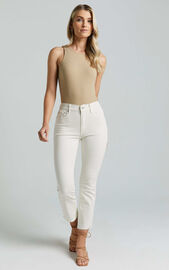 Elizena Jeans - Mid Rise Step Hem Cropped Denim Jeans in Ecru | Showpo USA