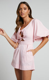 Khirara Playsuit - Tie Front Cut Out Puff Sleeve Playsuit in Ice Pink