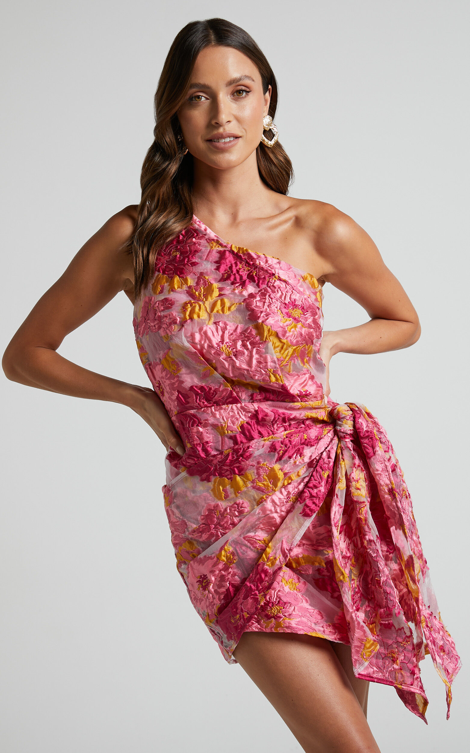 BRAILEY ONE SHOULDER WRAP FRONT MINI DRESS IN PINK JACQUARD