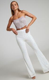 Deliza High Waisted Sequin Flare Pants in Iridescent White