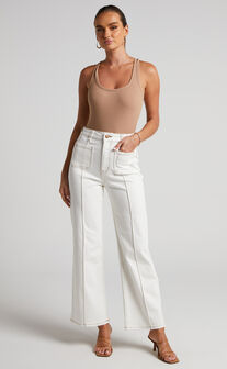 Malcolm Jeans - Mid Rise Contrast Stitch Flared Jeans in White Denim
