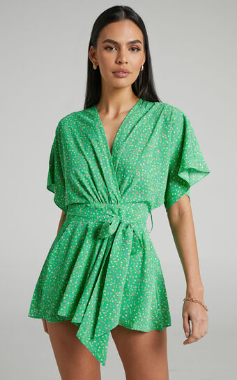 Feliza V Neck Flutter Sleeve Waist Tie Playsuit in Green Floral