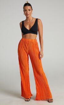 Beca Plisse Flared Pants in Bright Orange