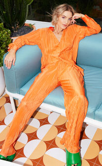 Beca Plisse Flared Pants in Bright Orange