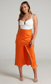 Teresina Asymmetric Bias Midi Skirt in Orange
