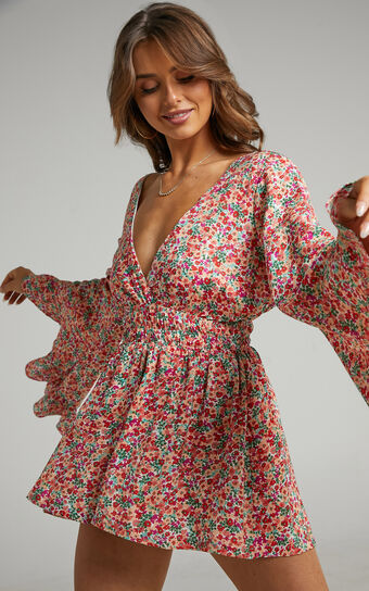 Mila Long Flared Sleeve Playsuit in White Floral