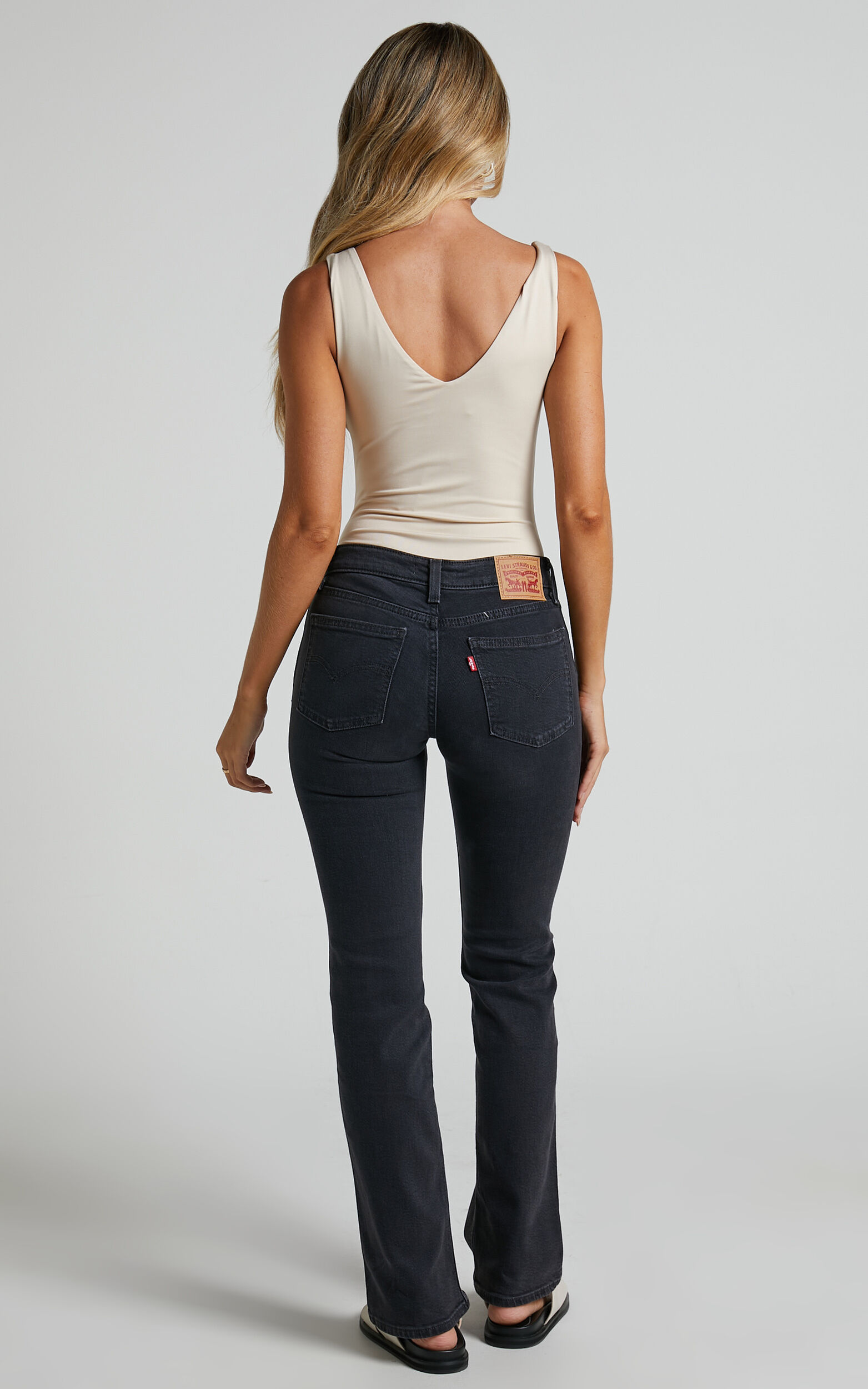Levi's - Superlow Boot Jeans in First Or Last | Showpo
