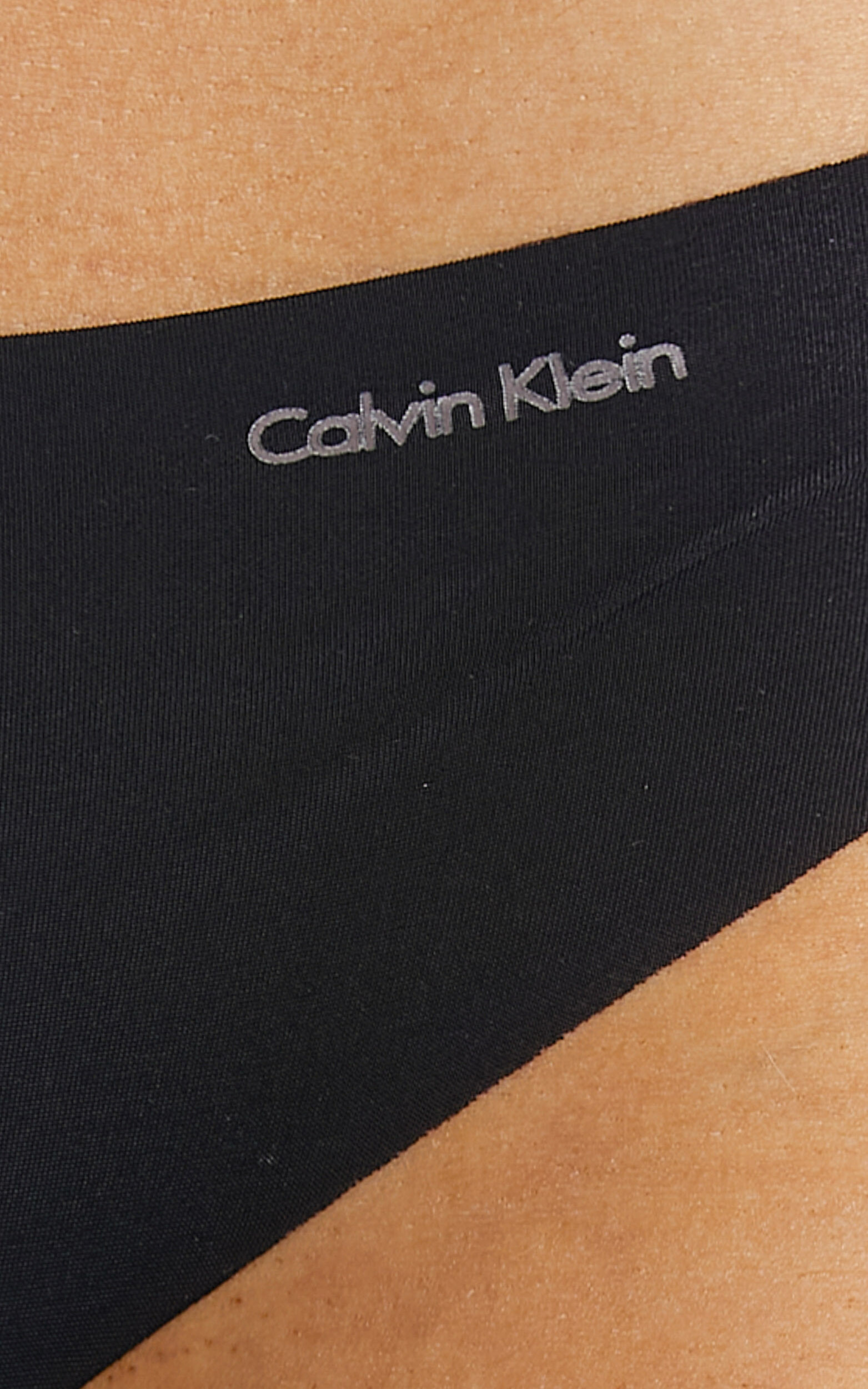 Calvin Klein - INVISIBLES THONG in Black | Showpo
