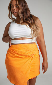 Kiandra Knot Detail Mini Skirt in Orange