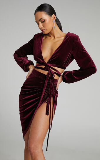 Maybelyn Velvet Ruched Asymmetric Skirt in Burgundy