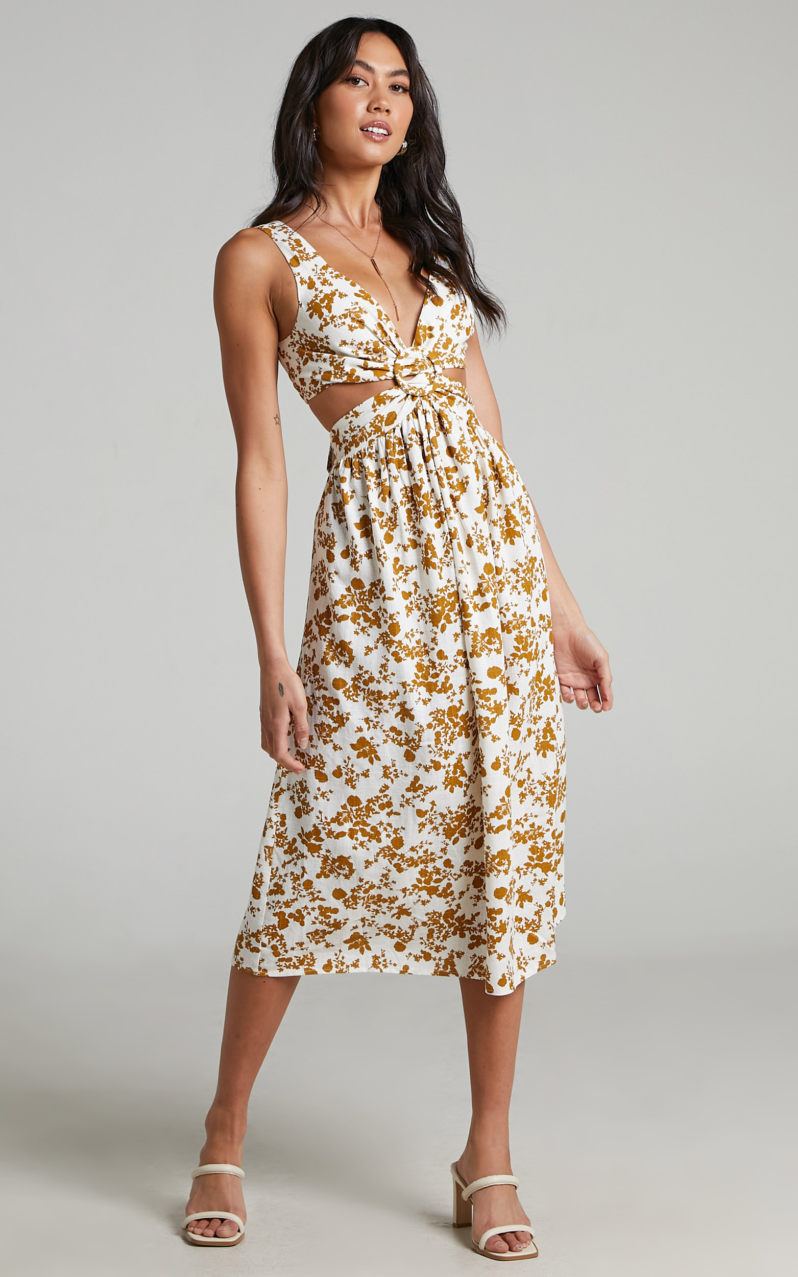 Timothea-Sleeveless-Ring-Front-Midi-Dress-in-Mustard-Floral
